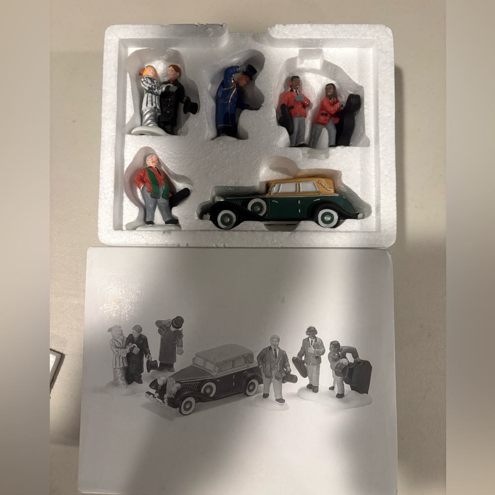 Christmas in the City Dept 56 stepping out on the town figurines